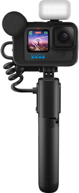 Angled front view of the GoPro HERO 12 Black Creator Edition featuring the lens and microphone