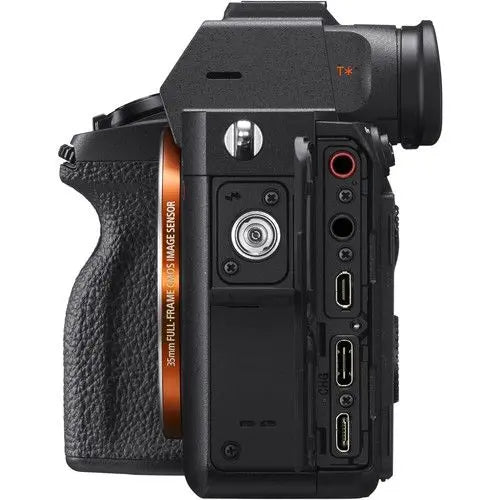 Side view of the Sony Alpha 7R IV Mirrorless Camera, highlighting multiple connectivity ports, including USB, HDMI, and microphone inputs.